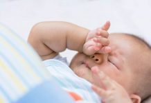 Baby Aggressively Rubbing Face: Causes and Solutions